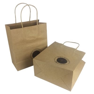 El SGS Flexo imprimió bolsos de compras de Brown que llevaban Kraft con las manijas