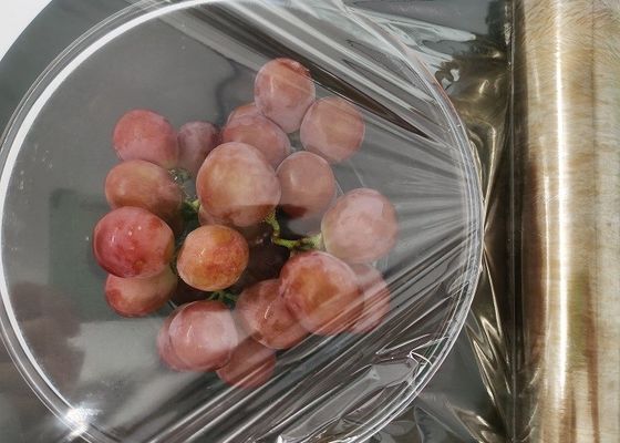 El empaquetado del plástico de embalar de Oven Food Grade de la microonda se aferra la película 9-12um transparente densamente