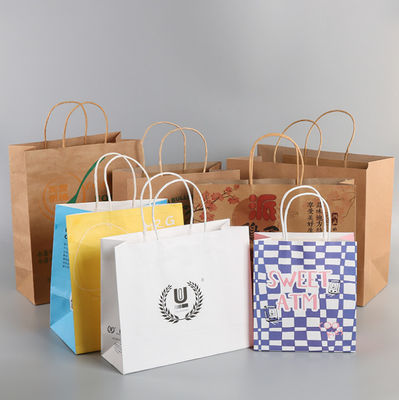Ambientalmente las bolsas de papel de Kraft del fotograbado de Brown con el logotipo imprimieron 28* los 22cm