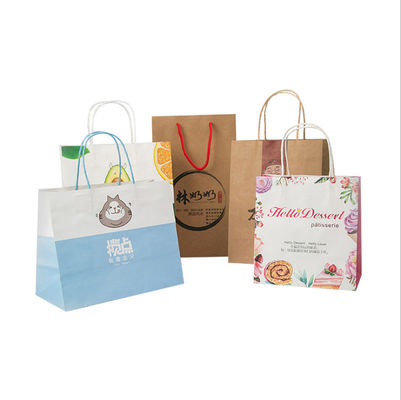 El color imprimió bolsos de compras amistosos del papel de Eco que llevaban Kraft con las manijas